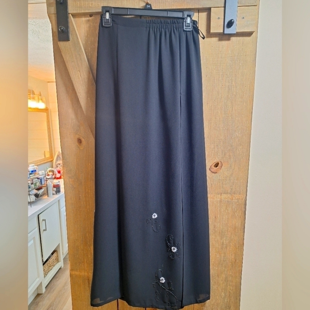 An Adrianna Papell maxi length split hem A cut skirt with embroidered flowers